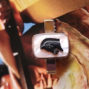vintage tie bar with a trojan horse